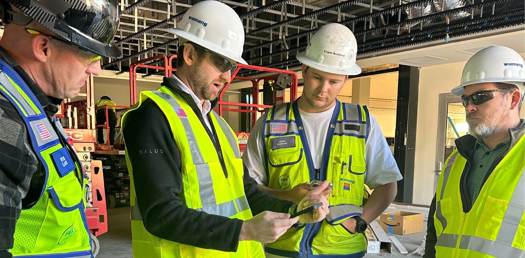 A construction crew gathered together on a jobsite
